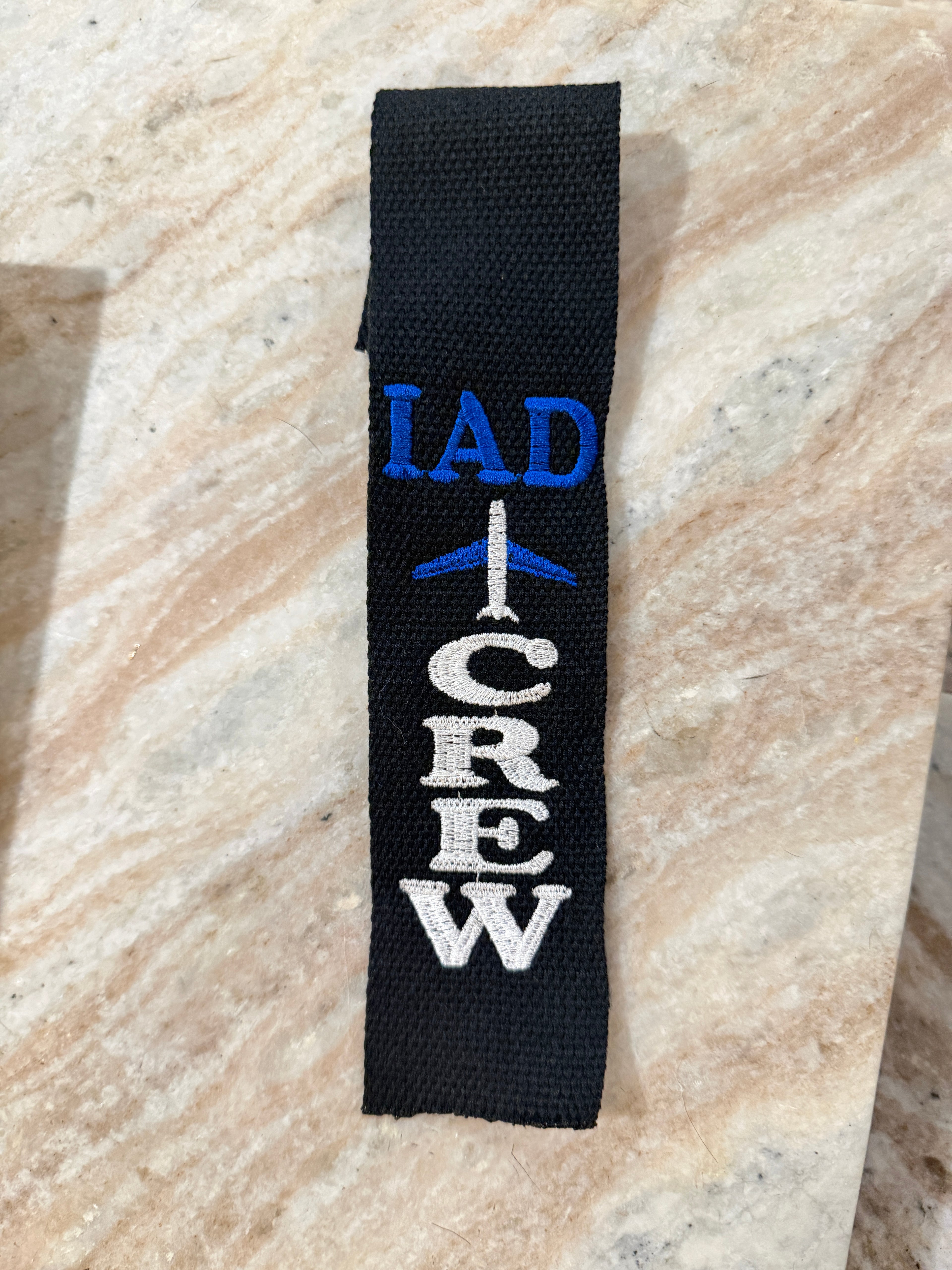 Button Crew tag